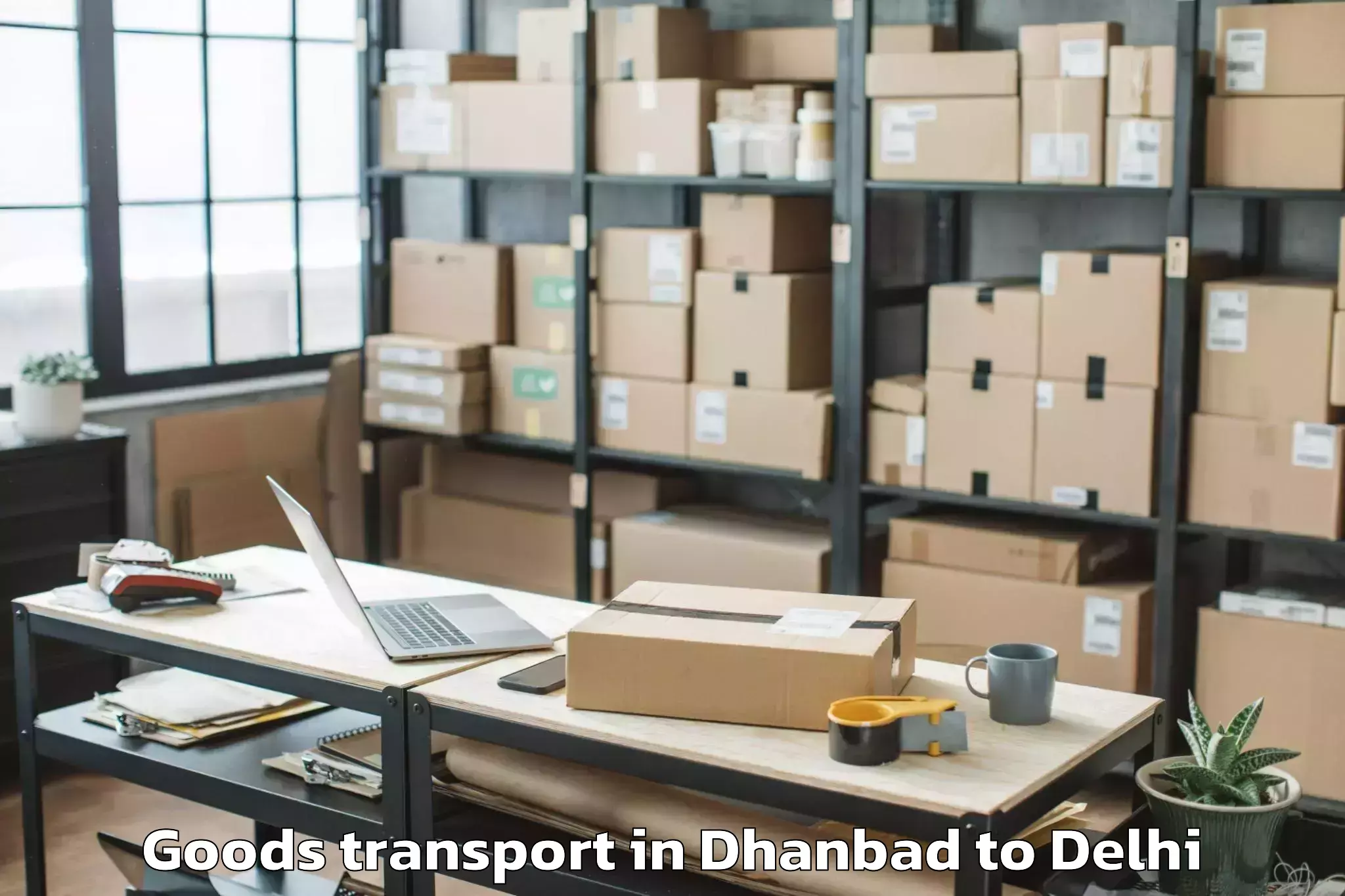 Dhanbad to Pacific Mall Tagore Garden Goods Transport